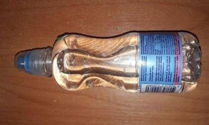 В Николаевский СИЗО пытались передать запрещенное вещество в бутылке из-под минералки